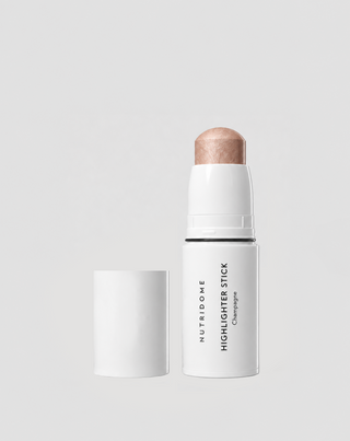 Highlighter για πρόσωπο και σώμα σε στικ, λαμπερή λάμψη και αποτέλεσμα λείανσης champagne nutridome